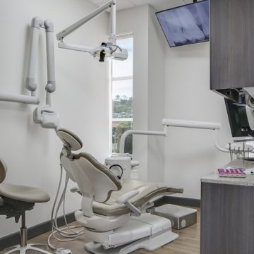 patient treatment room with dental chair
