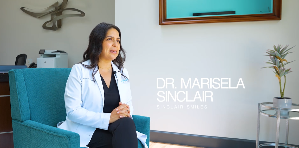 Dr. Sinclair smiling